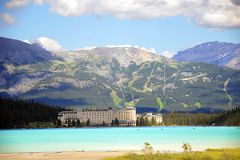 32 Chateau Lake Louise At The Far End Of Lake Louise Below Mount Whitehorn and Redoubt Mountain From Descent Of Plain Of Six Glaciers Trail Near Lake Louise.jpg